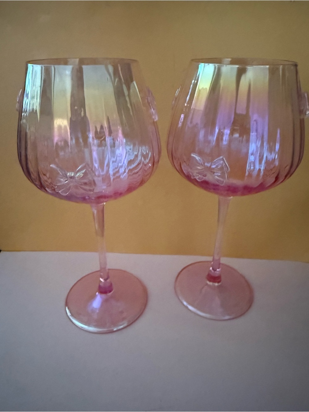 Pink Iridescent Stemmed Wine Glass - with Pink Bows around Glasse